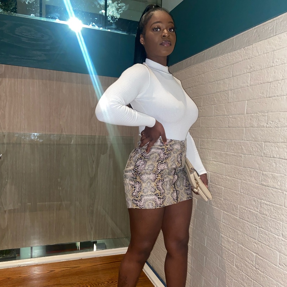 Mini Snake print skirt.